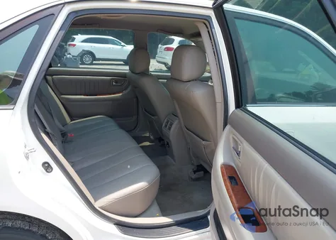 2004 Toyota Avalon Xls z USA, uszkodzony, nr VIN 4T1BF28B44U353750